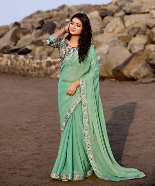Minz farbenes georgette Saree mit bestickter Bluse