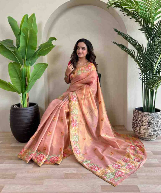 Warme Sanftheit im peachfarbenen Saree